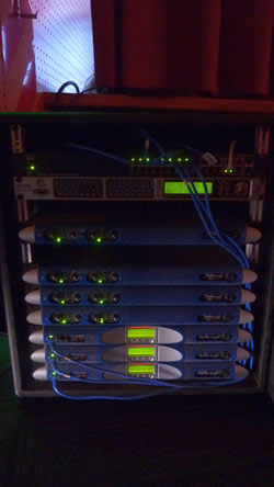 Rack with a processor, four Powersoft M Series and three K Series amplifiers