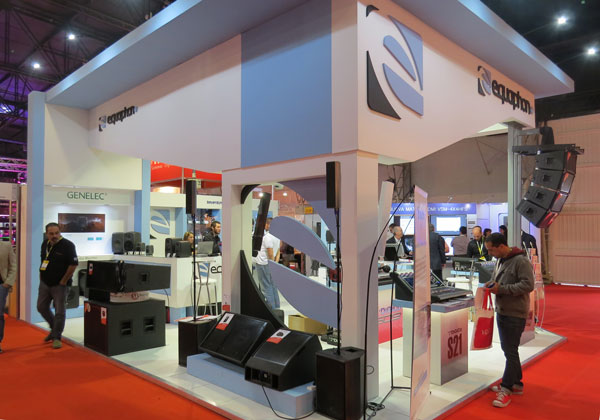 Equaphon booth at a trade show, with loudspeakers, stage monitors and a line array hanging from the structure