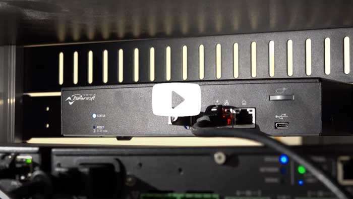 VERSO unit installed in a rack with a network cable connected, with a video play button