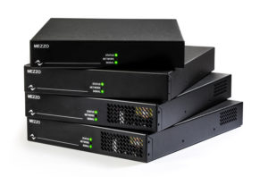 Four Mezzo amplifiers stacked, front panels with status, network and signal LEDs