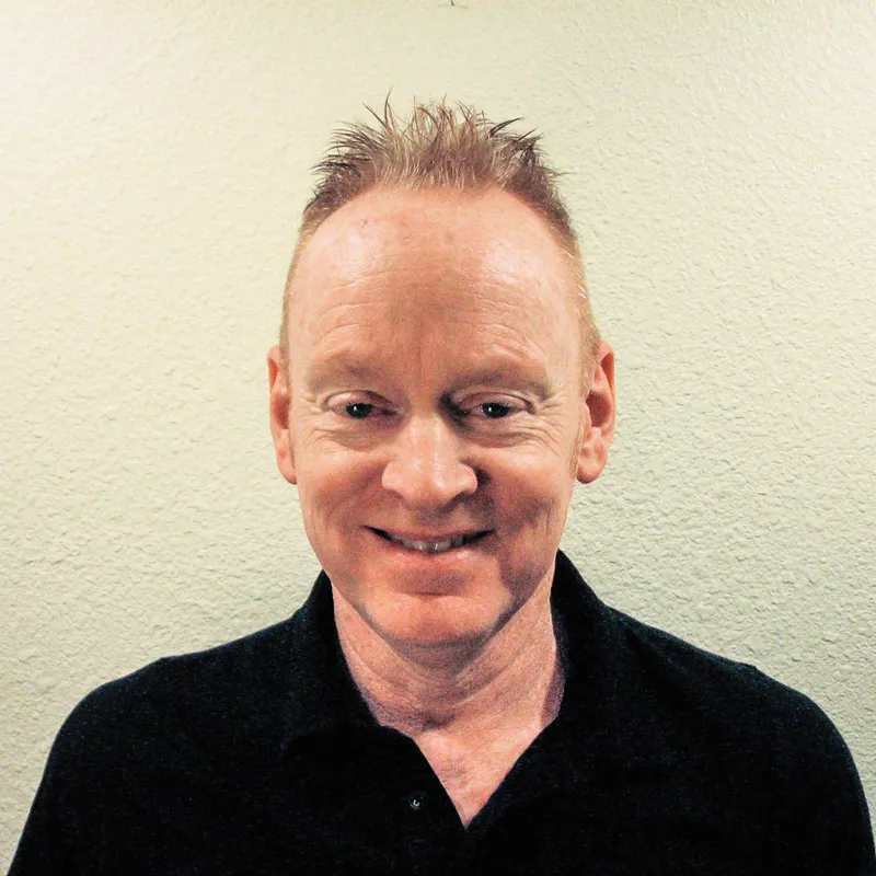 Kurt Metzler, portrait in a black polo shirt