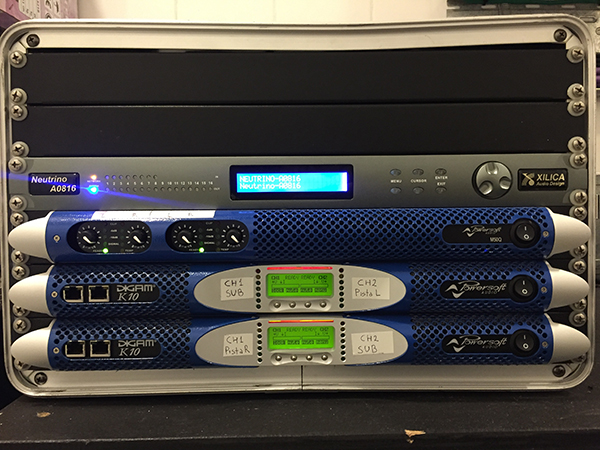 Rack with a Xilica Neutrino A0816 processor, a Powersoft M50Q and two Powersoft K10 amplifiers